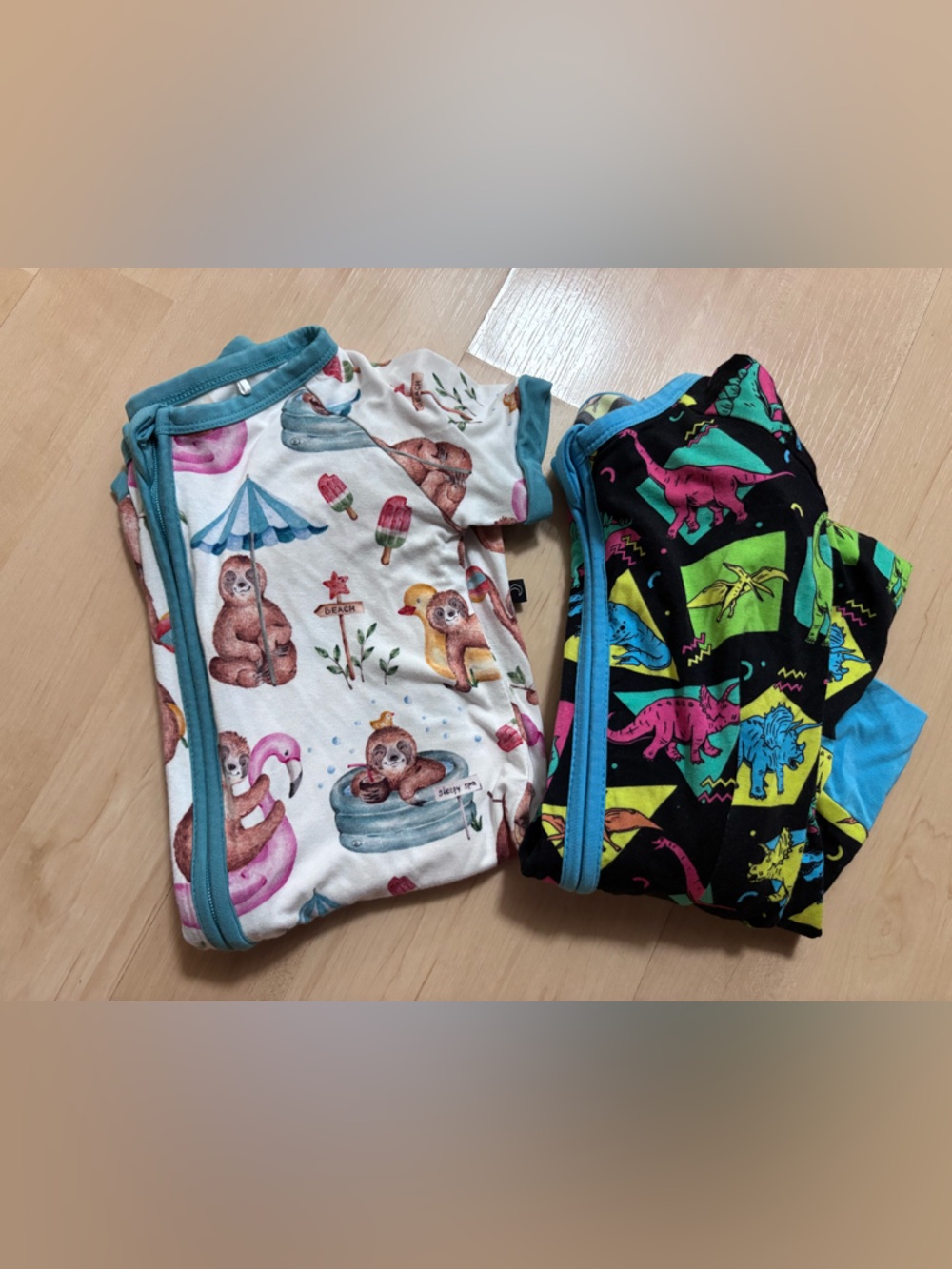 The sleepy sloth onesies x2